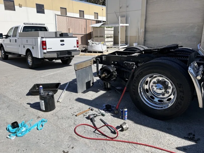RES Heavy service truck on site for a semi truck wheel and hub job at a commercial yard